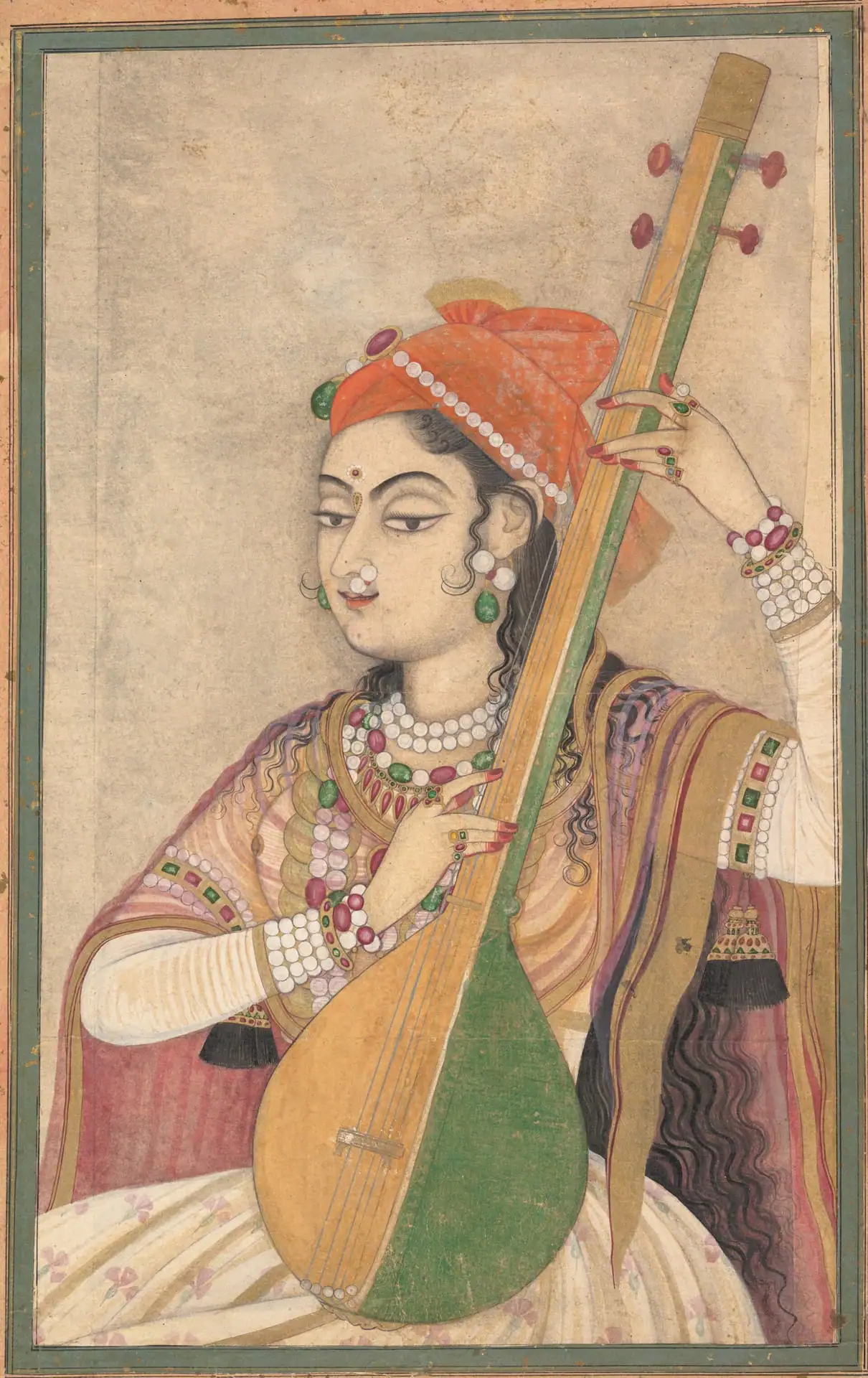 A Kishangarh miniature painting of a lady in a saffron turban playing the tanpura